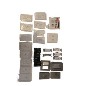 Assorted Electrical Outlet and Switch Covers with Switches and Outlets